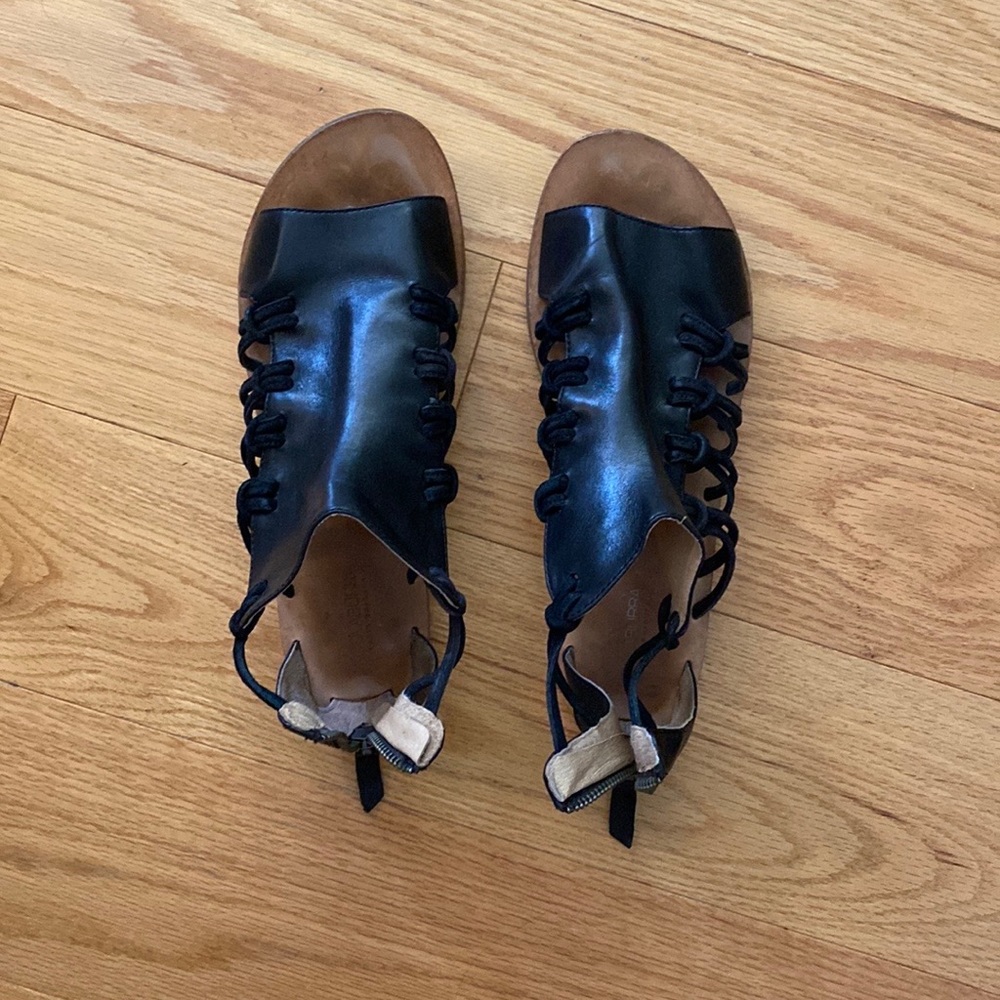 Worn less than 6 times. Perfect condition